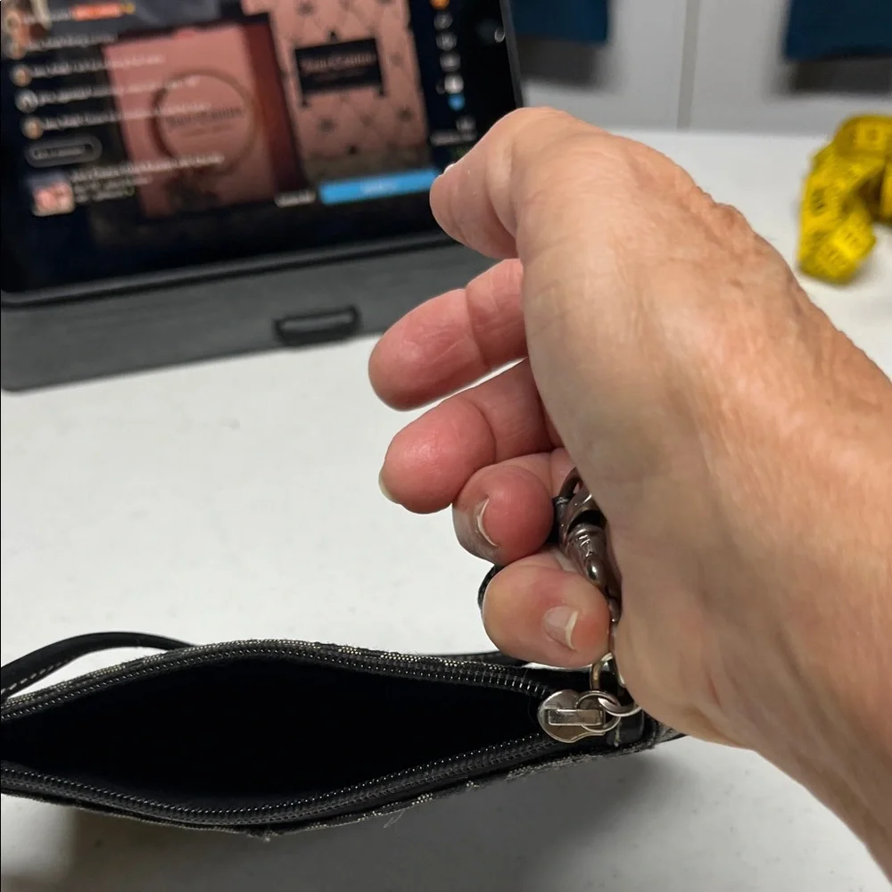 Vintage Coach Elegant Black and Tan Logo Women's Wristlet